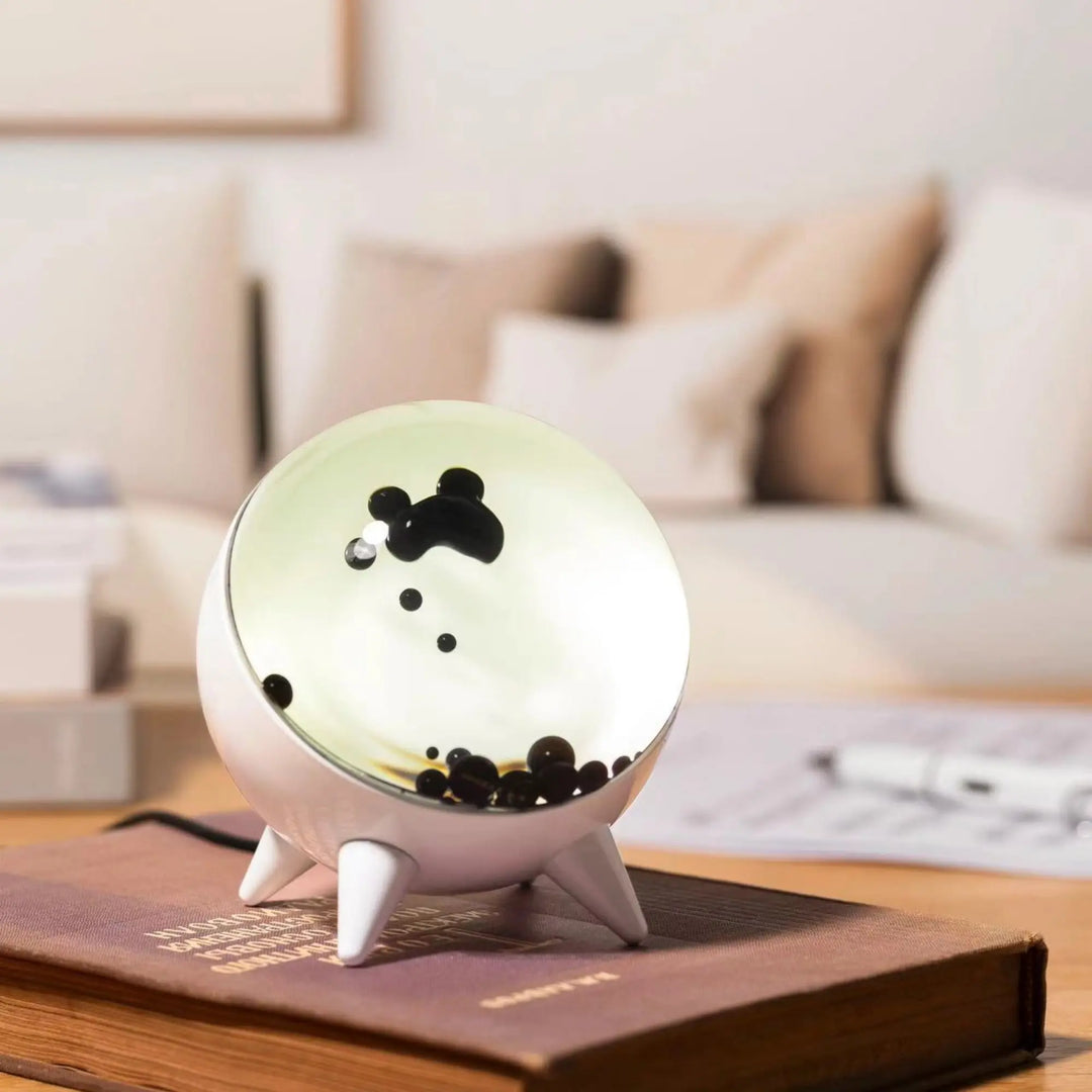 MagnePulse interactive ferrofluid display & Bluetooth speaker, offering mesmerizing music-reactive visuals and sound.