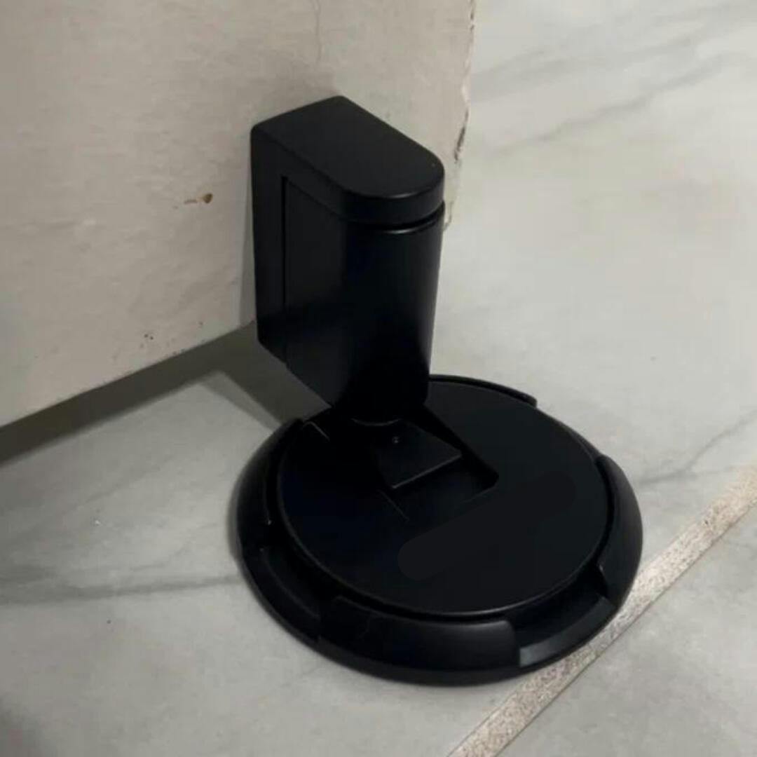Self-adhesive magnetic door stopper. No-drill installation for easy home safety and wall protection.