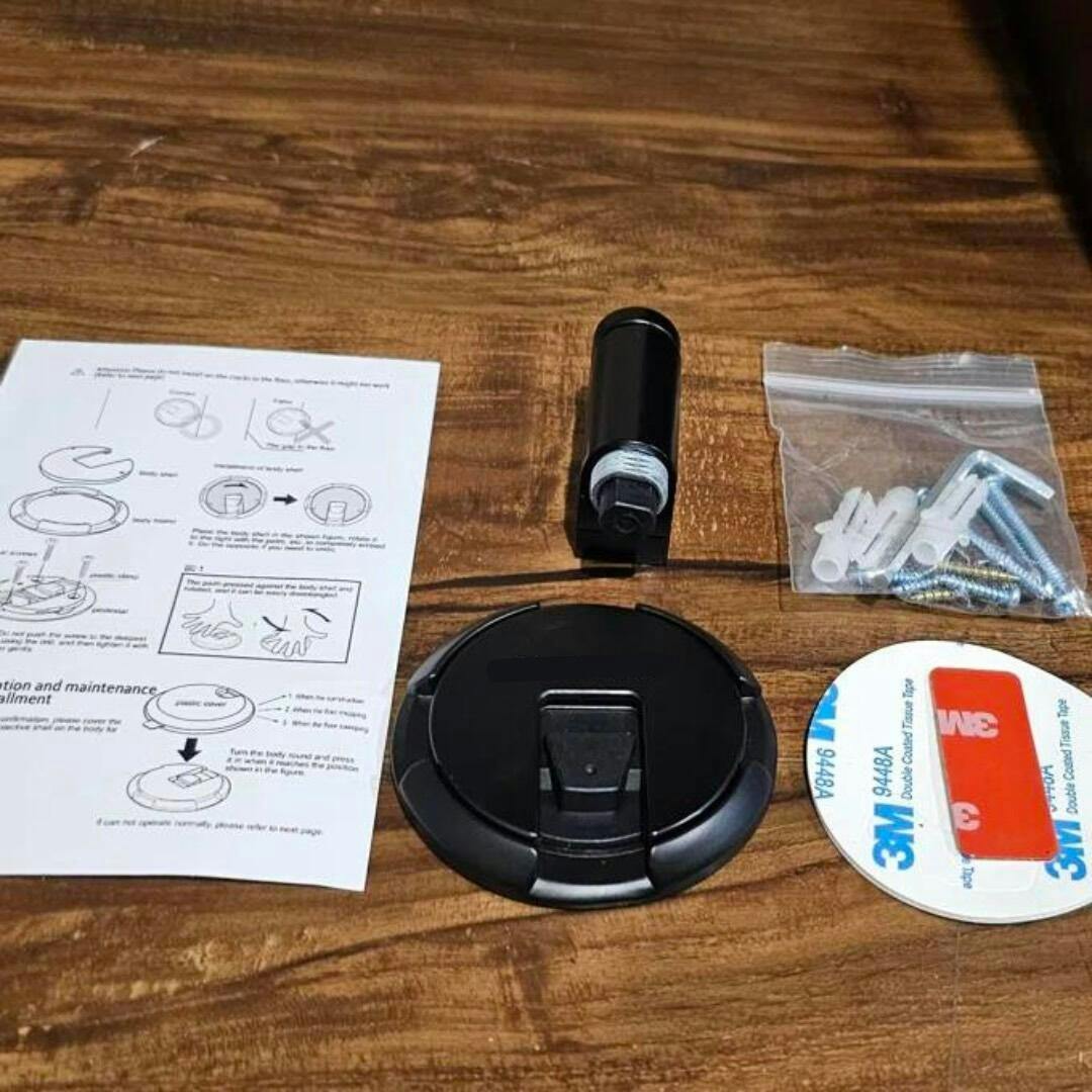 Sleek black magnetic door stopper. Modern no-drill design for secure door holding & wall protection.