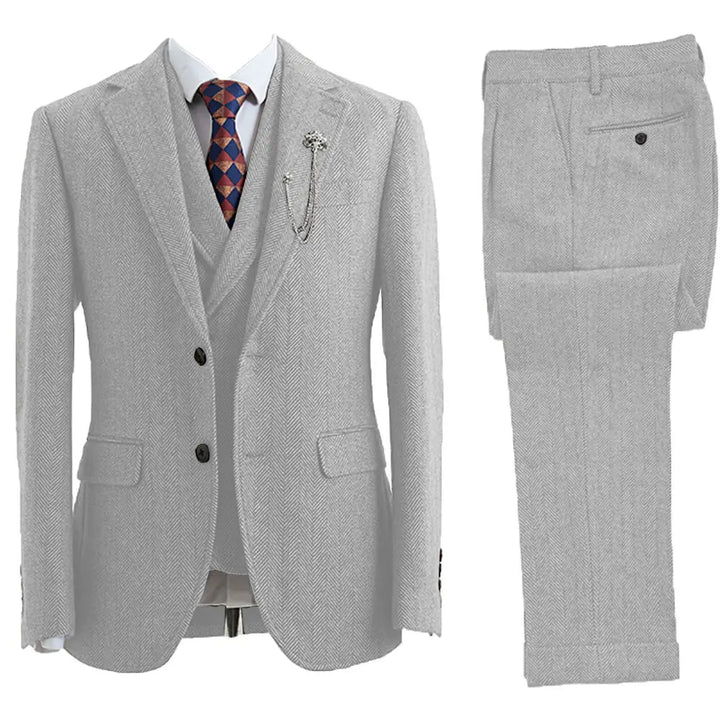 Stylish men's Leonard herringbone suit, 3-piece tailored fit, essential for sophisticated gentlemen's formal wear.