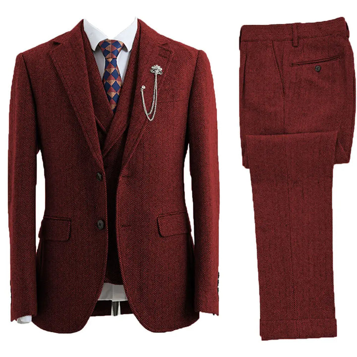 Elegant men's business attire: a 3-piece herringbone suit with tailored fit, suitable for professional events.