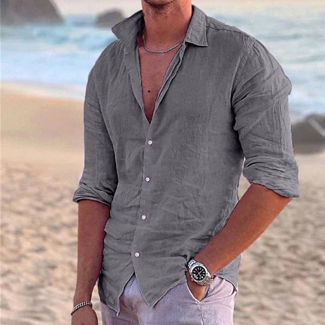 Men's button-down long-sleeve resort wear shirt, airy fabric for warm weather comfort.