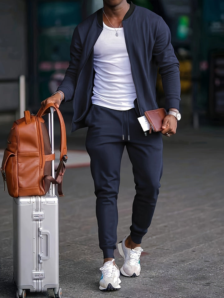 Casual men's tracksuit set in grey with a full-zip jacket and matching joggers, comfortable activewear