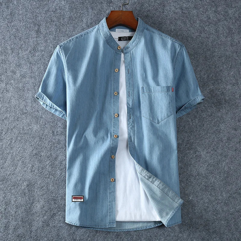 Comfortable men's short sleeve band collar polo. Versatile top for casual or dressed-up looks, stylish & breathable.