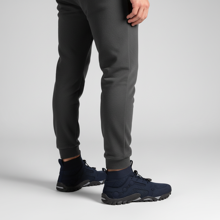 Close-up: breathable material on men's barefoot high shaft hiking shoes, ensures comfort during long hikes.