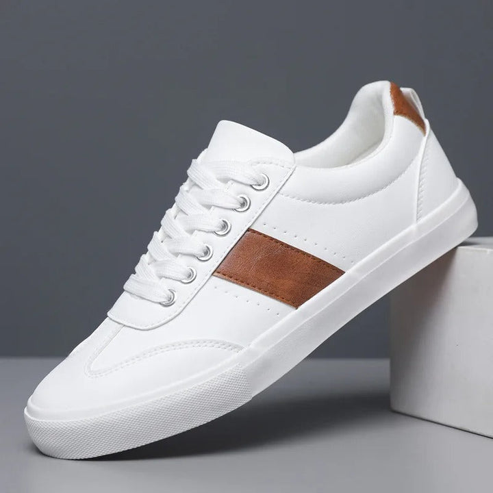 Men's everyday black sneakers with a sleek matte finish, providing comfort and style