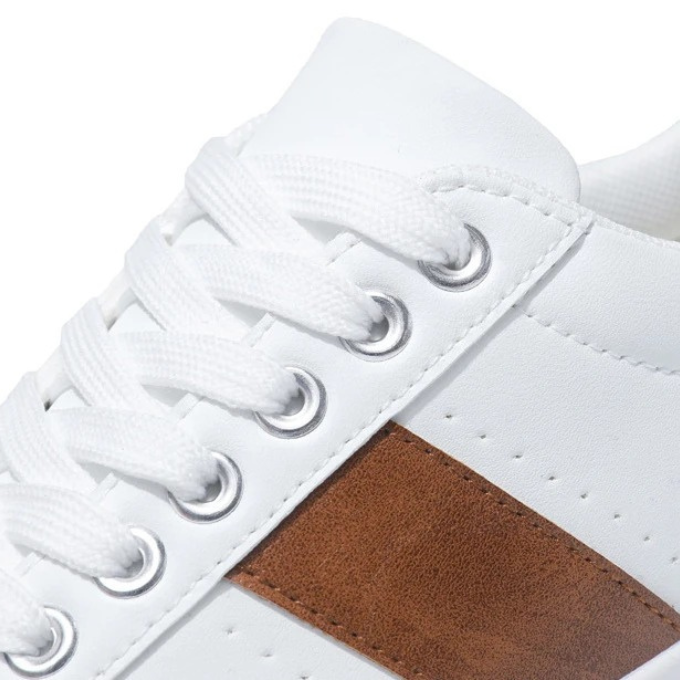 Classic white men's everyday sneakers with suede accents, offering casual style and comfort