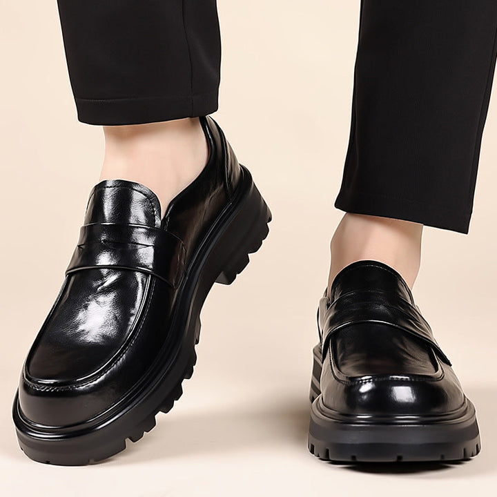 Men's black chunky penny loafers, stylish slip-on casual and dress shoes for comfortable, durable everyday wear.