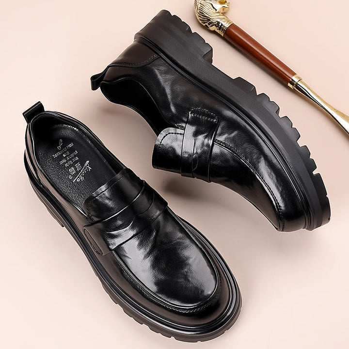 Durable men's chunky penny loafers, classic slip-on moccasin style for comfortable wear, ideal for casual or dress.