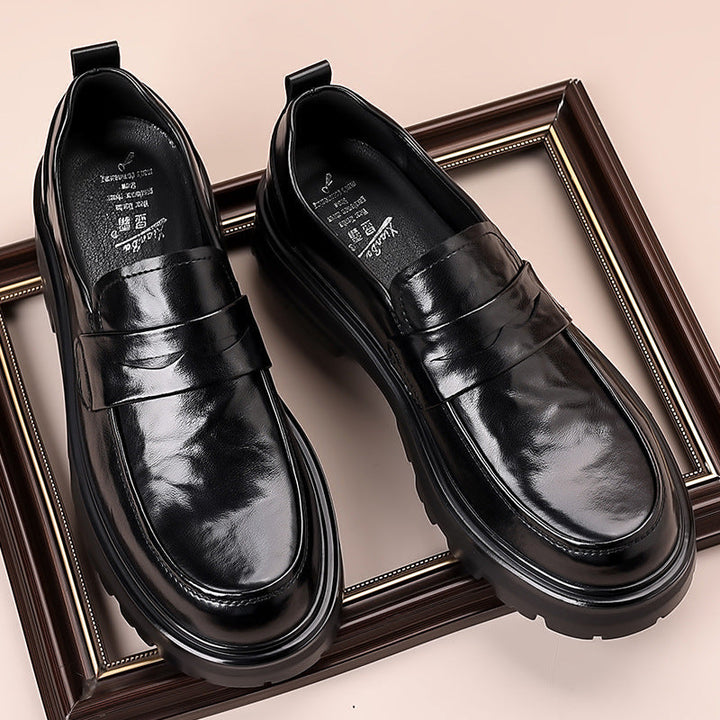 Brown men's chunky penny loafers, comfortable slip-on shoes suitable for both casual outfits and dress occasions.