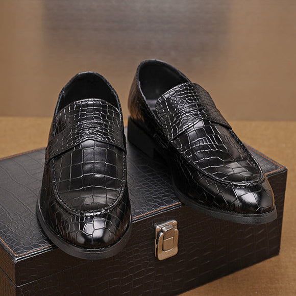 Three-quarter view of men's modern crocodile embossed leather loafers for sophisticated outfits