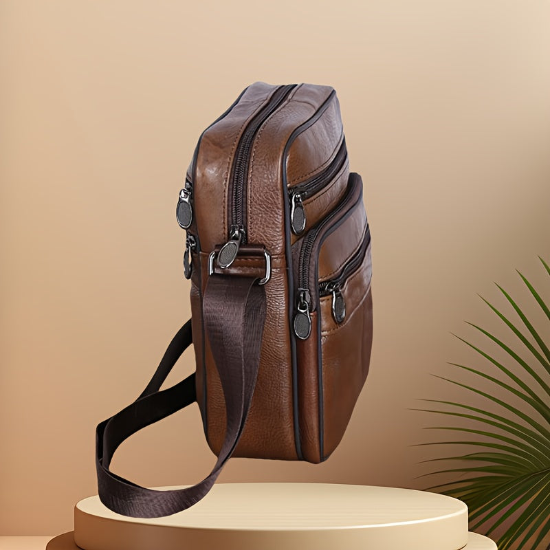 Stylish men's messenger bag; organized for daily essentials, perfect for travel & casual use.