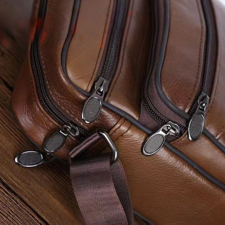 Durable men's crossbody bag, versatile for professional or casual use, holds essentials neatly.
