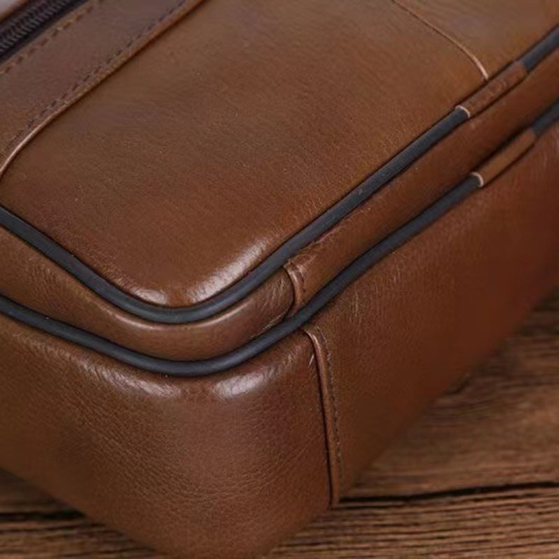 Sleek men's crossbody accessory for daily use; adjustable strap provides comfort & hands-free convenience.