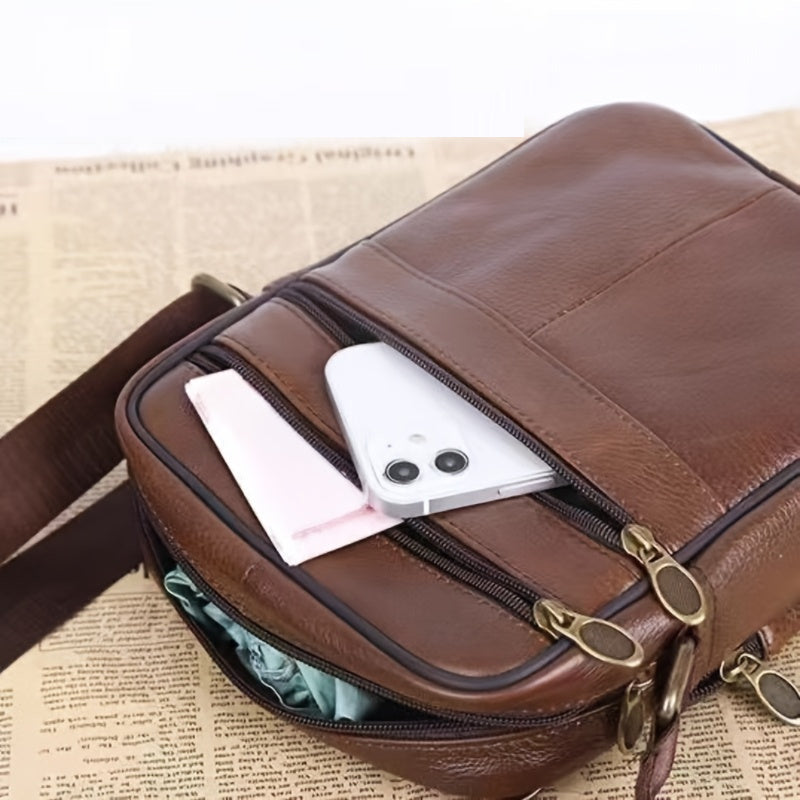 Versatile men's black shoulder bag, perfect for commuters; secure, organized, and comfortable for daily carry.