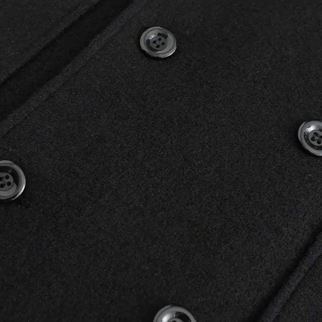 Elegant tailored men's black double-breasted overcoat for formal wear & business attire.