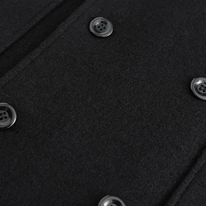 Elegant tailored men's black double-breasted overcoat for formal wear & business attire.