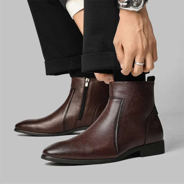 Stylish men's leather ankle boots featuring convenient side zipper, ideal for dress or casual outfits
