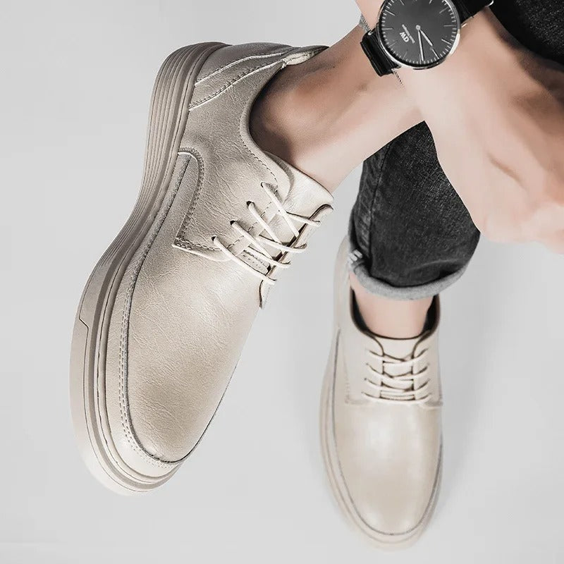 Men's leather dress shoe and sneaker hybrid, merging formal elegance with athletic comfort.