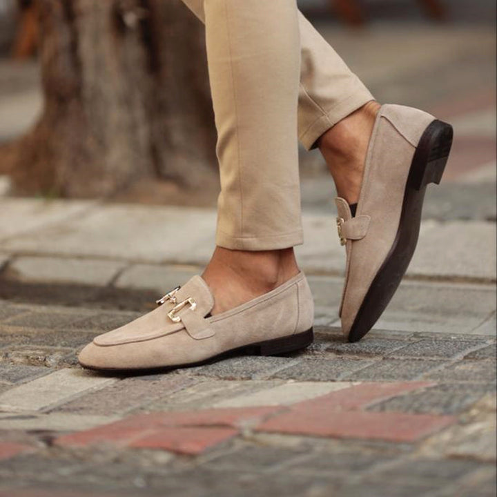 Classic men's brown leather horsebit loafers, easy slip-on style. Perfect men's fashion statement for business or casual.