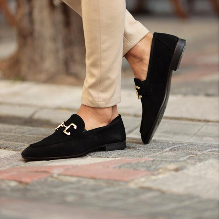 Stylish black horsebit men's loafers. A comfortable slip-on formal shoe or smart casual option for modern men's fashion.
