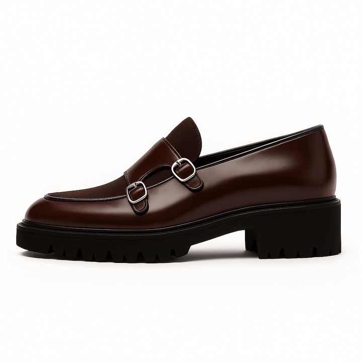 Close-up of elegant men's monk strap loafers, featuring polished buckles and a sleek design for formal wear.