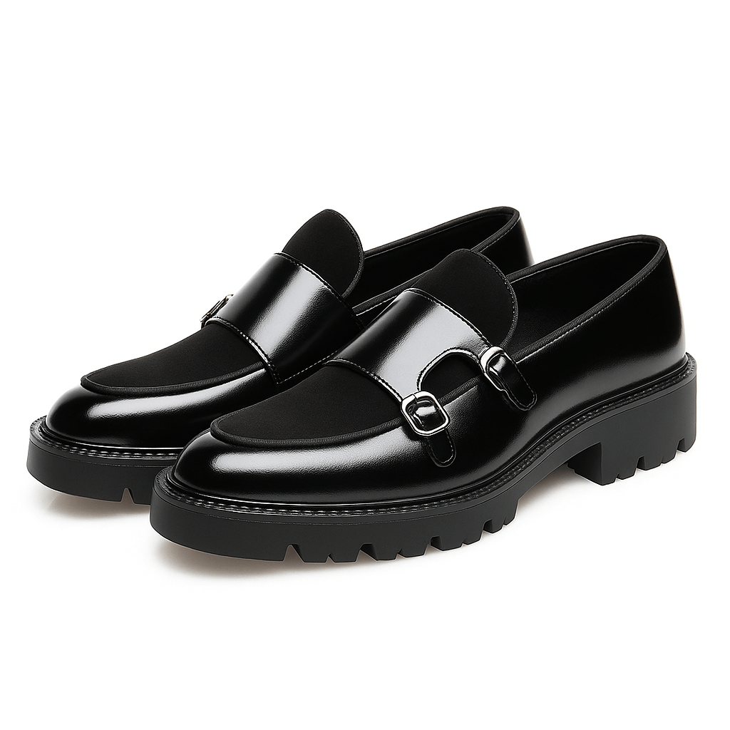 Modern men's slip-on dress shoes: sleek monk strap loafers in dark leather. Ideal for a sharp, contemporary look.