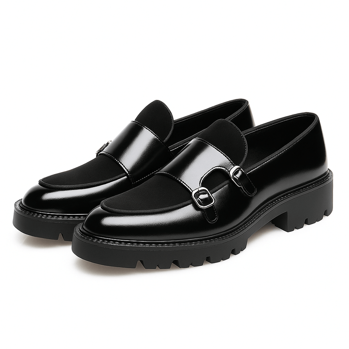 Modern men's slip-on dress shoes: sleek monk strap loafers in dark leather. Ideal for a sharp, contemporary look.