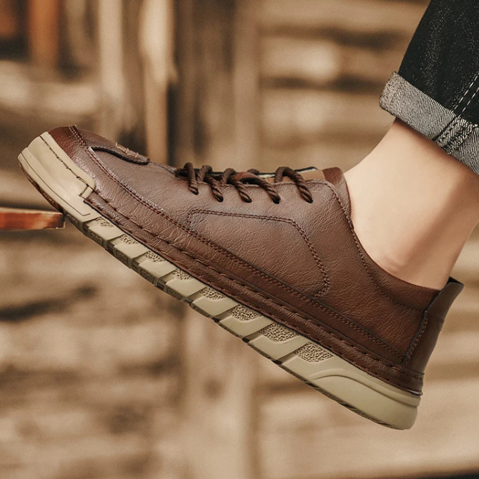 Detail shot of the laces on men's black leather dress casual shoes, a timeless design