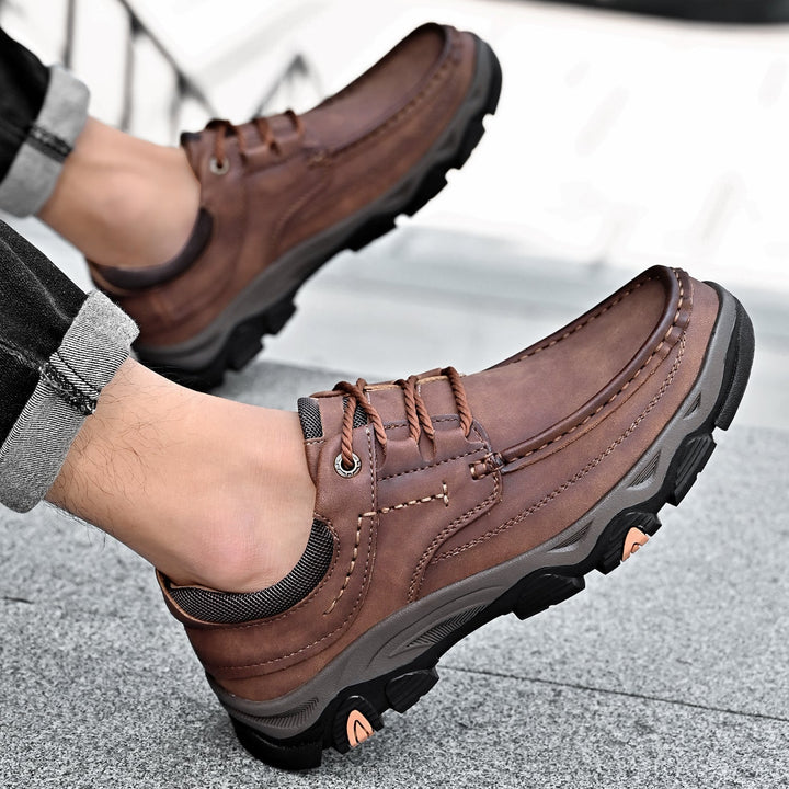 Man wearing black orthopedic laced loafers with arch support, walking casually outdoors