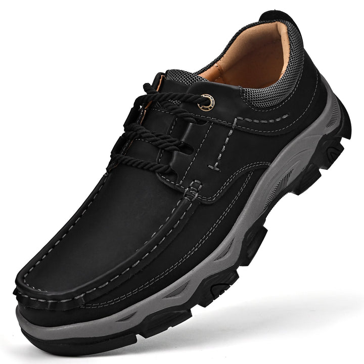 Close-up of the leather texture on men's orthopedic loafers, ensuring quality and comfort