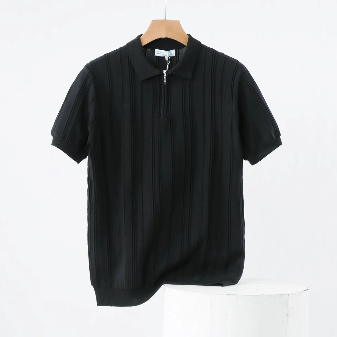 Casual yet refined men's black ribbed knit polo with a functional half-zip neckline.