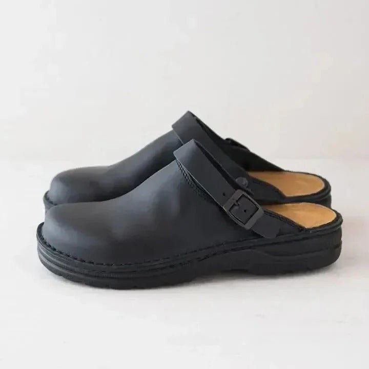 Men's casual slip-on mules with heel strap, offering easy comfort for daily wear. Perfect indoor outdoor footwear.
