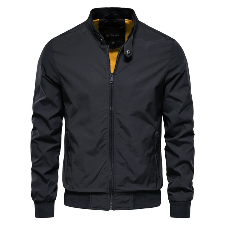 Men's black streetwear zip jacket with standing collar, front view. Ideal for urban casual fashion.