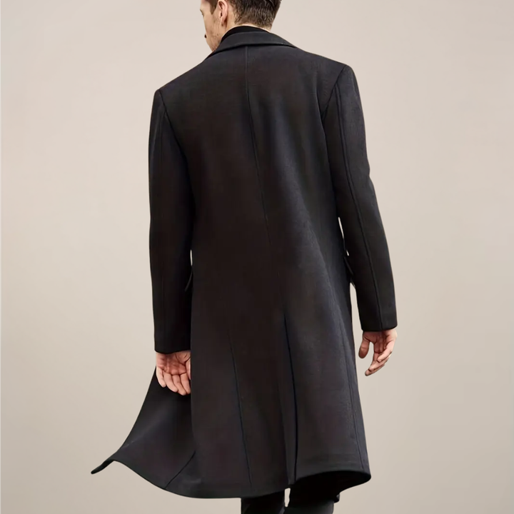Elegant men's long black overcoat. Ideal for formal winter occasions, a classic tailored outerwear piece.
