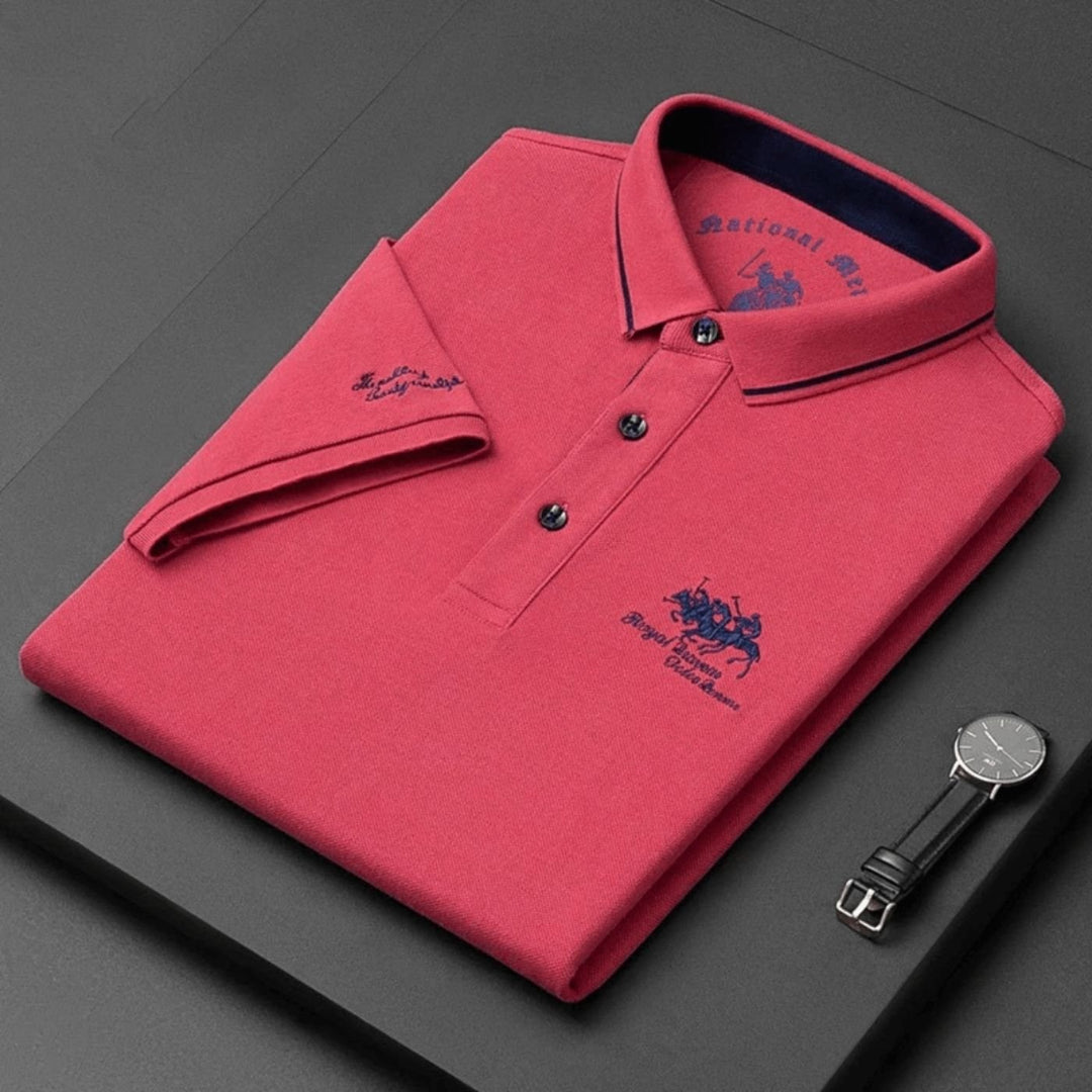 Stylish men's polo shirt, short sleeve, with intricate embroidery, made from breathable fabric for comfort.