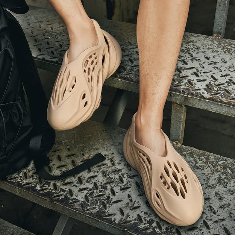 Stylish men's slip-on summer footwear, offering ultimate breathability and comfort for warm weather activities.