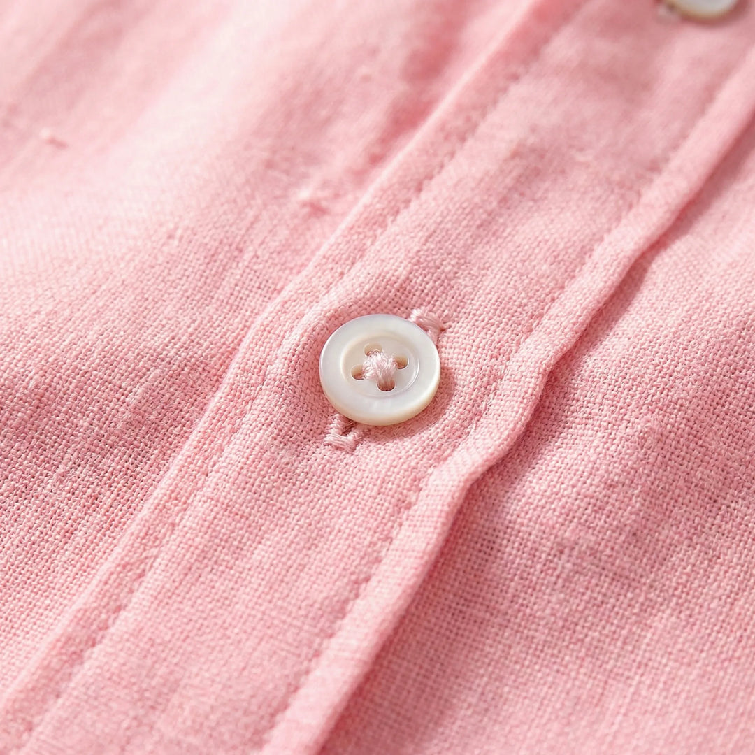 Breathable men's casual button-up top, relaxed fit for everyday warm weather style.