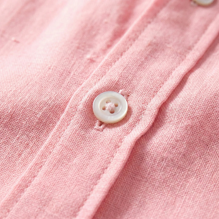 Breathable men's casual button-up top, relaxed fit for everyday warm weather style.