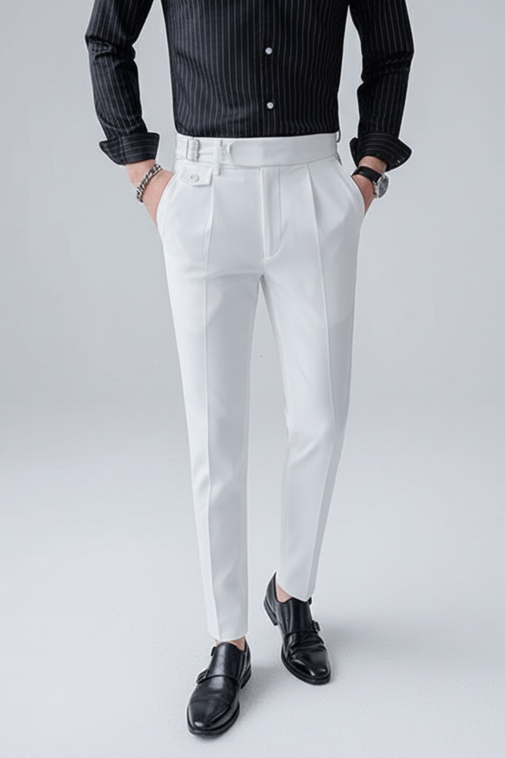 Elegant men's pleated trousers for work. Classic British style, slim fit design suitable for office.