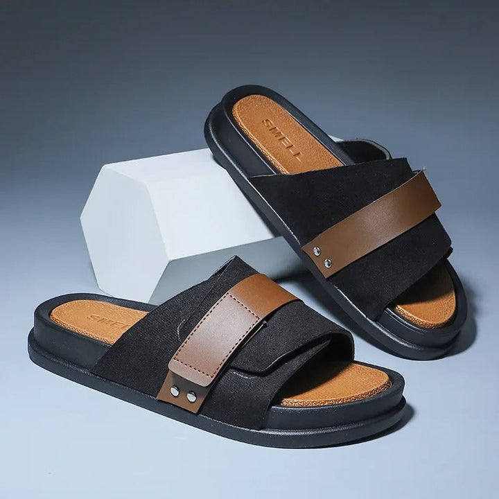 Men's black suede comfort slides with ergonomic footbed, perfect for summer casual fashion