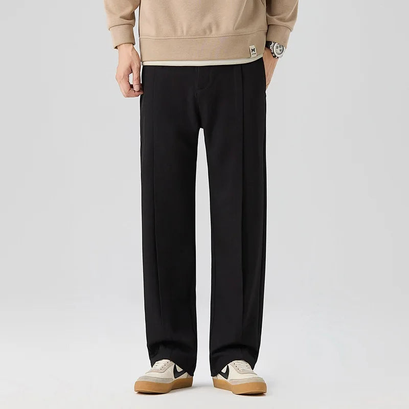 Khaki men's Brunello drape trousers. Relaxed fit pleated pants for elegant everyday fashion.