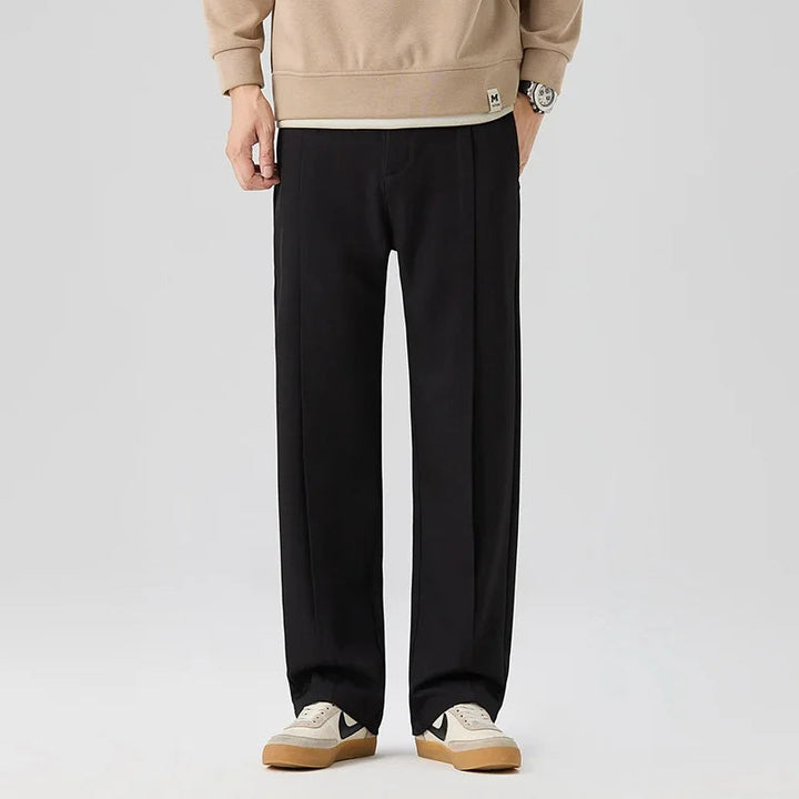 Khaki men's Brunello drape trousers. Relaxed fit pleated pants for elegant everyday fashion.