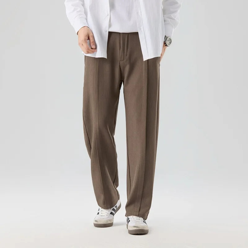 Gray men's Brunello drape trousers. Elegant pleated pants, perfect relaxed fit bottoms for men.