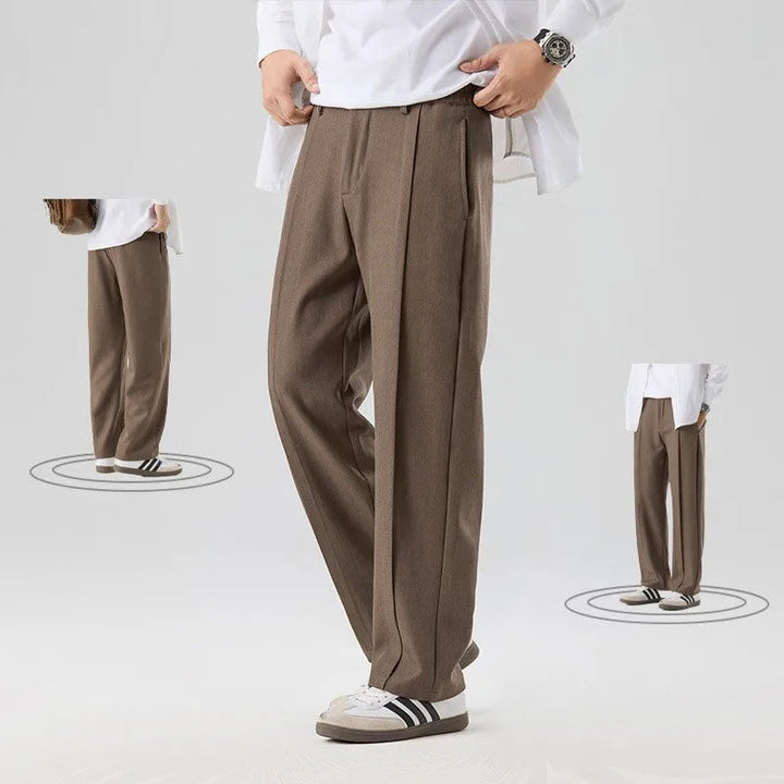 Brunello men's drape trousers. Relaxed fit pleated pants offering sophisticated comfort and style.