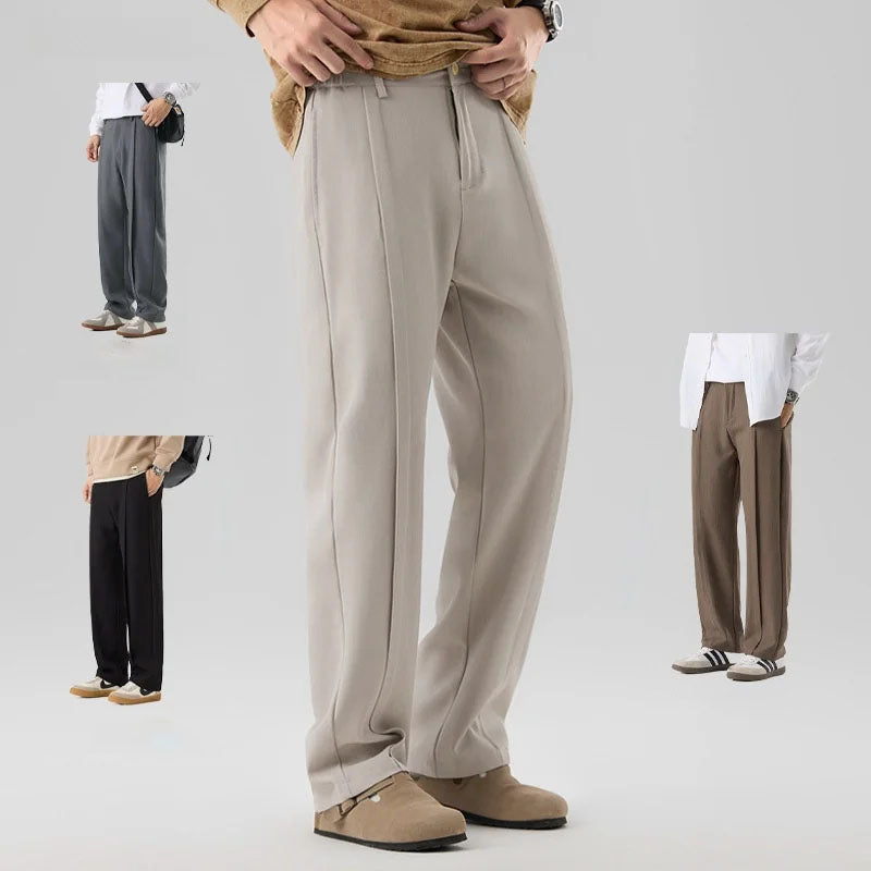 Men's Brunello drape trousers. Versatile pleated bottoms for sophisticated formal and casual men's fashion.