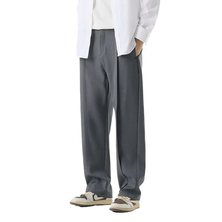 Men's Brunello drape trousers. Elegant pleated pants, comfortable relaxed fit bottoms for versatile styling.