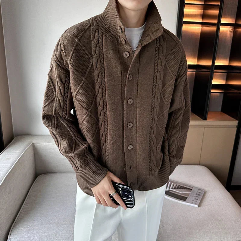Men's cable knit cardigan, chunky button-front sweater for stylish layering. Relaxed fit, perfect for smart casual.