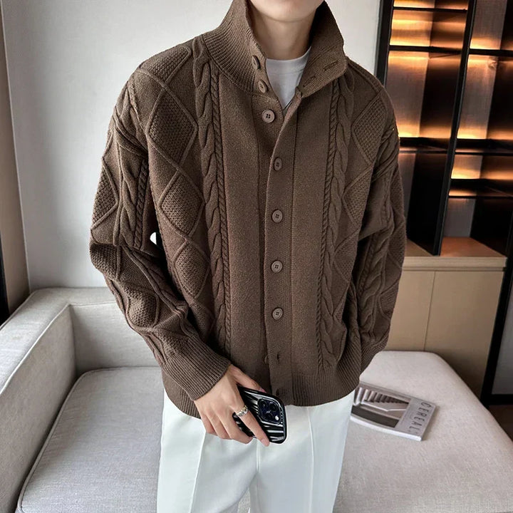 Men's cable knit cardigan, chunky button-front sweater for stylish layering. Relaxed fit, perfect for smart casual.