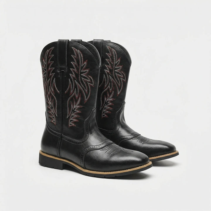 Embroidered men's western boots; calf-length design, block heel, offering durable rugged style.
